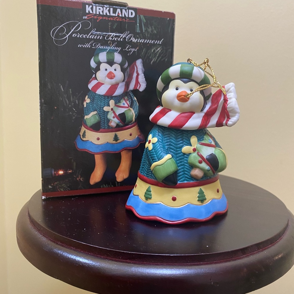 Kirkland Signature Porcelain Bell Ornament with
Dangling Legs Penguin With Box